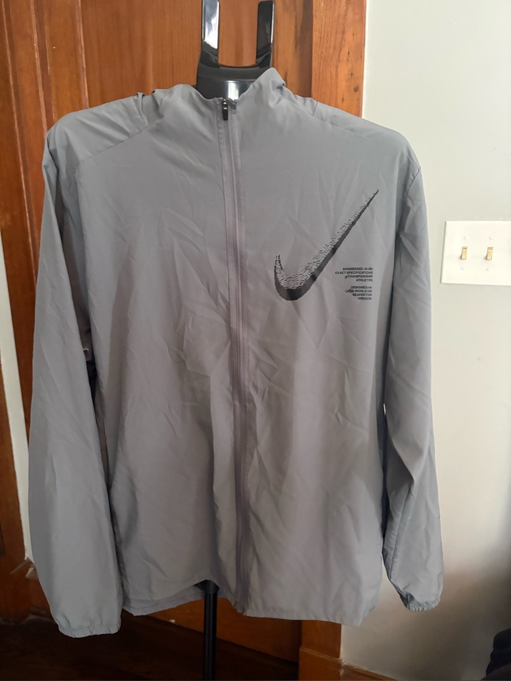 Nike Gray Full-Zip Windbreaker with Black Swoosh